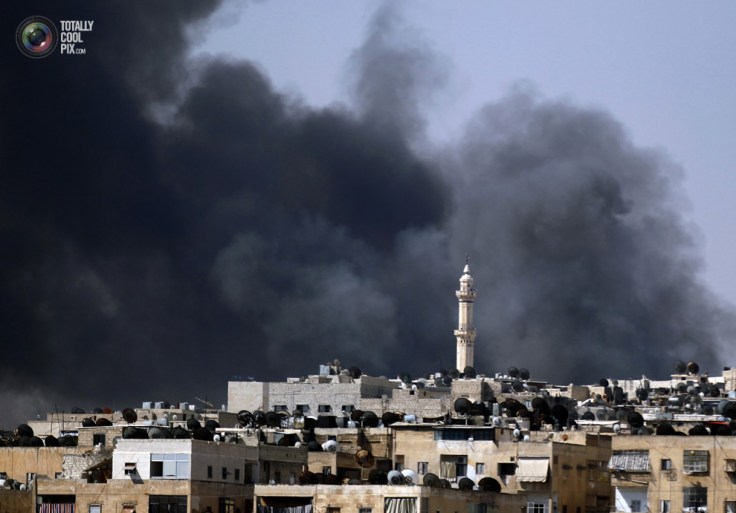 Smoke rises over the Salah al-Din neighbourhood in central Aleppo during clashes between Free Syrian Army fighters and Syrian Army soldiers. GORAN TOMASEVIC/REUTERS